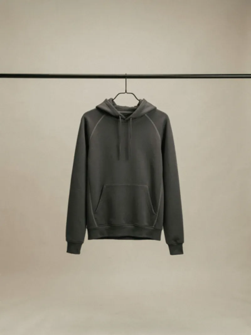 Charcoal hoodie on a rail